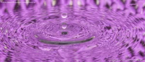 Frozen in Motion: Bruce Graham’s Water Droplet Ripples in Vivid Purple from the Signature Collection